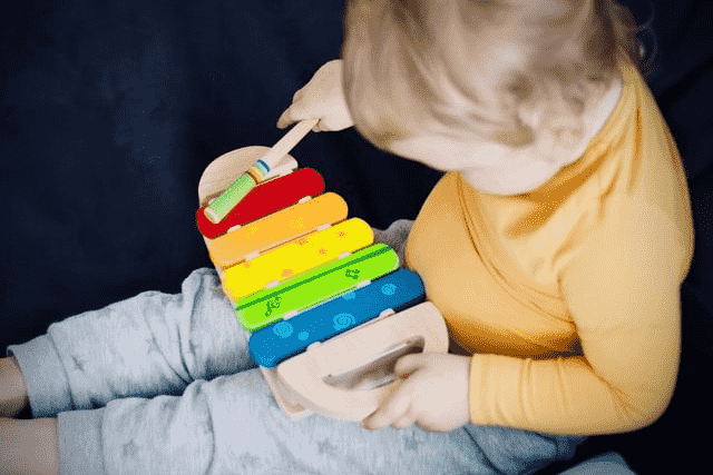 childlike version of yourself playing xylophone